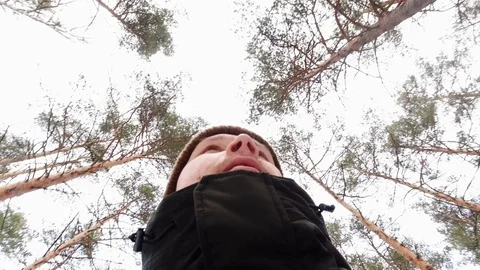 A young man running through the woods from pursuers. Fear, loss, lost, chase. Stock Footage 123898920