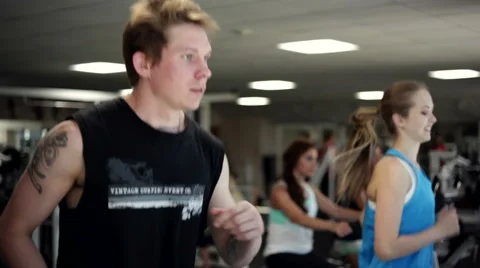 Young Man Running on a Treadmill Stock Footage 41772839