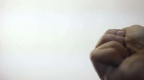 Young man' s hand is opening. There is a chocolate inside. Stock Footage 37183750