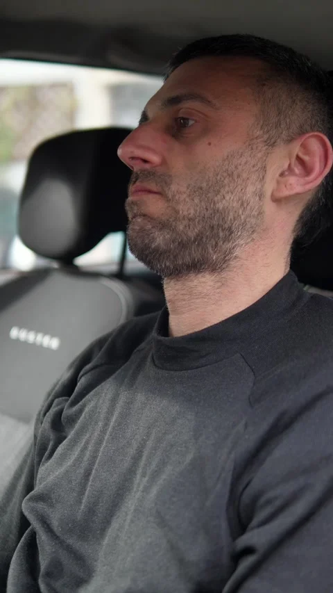 Young man sad in car after breakup feeling emotional pain Stock Footage 332417965