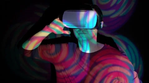 Young man saluting in virtual reality headset Stock Footage 86612979