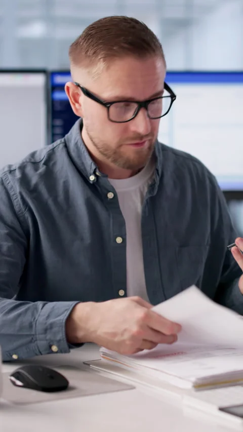 Young Man Scans Invoice Documents Stock Footage 330582621
