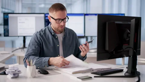 Young Man Scans Invoice Documents Stock Footage 331150368