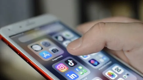 Young man scroll iphone screen. iphone display screen swipe. Stock Footage 254066431