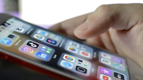 Young man scroll iphone screen. iphone display screen swipe. Stock Footage 254066571