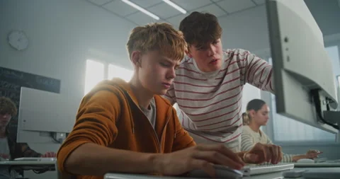 Young Man Seeks Advice on Programming During University Lesson Stock Footage 318518005