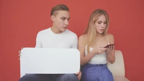 A young man sends a message to his girlfriend Stock Footage 142421134