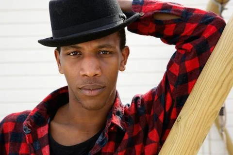 Young man with serious expression Stock Photos
