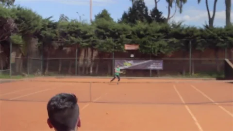 Young man serving in tennis Video stock 75167280