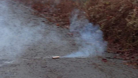 The young man sets fire to new year firecrackers Stock Footage 100543006