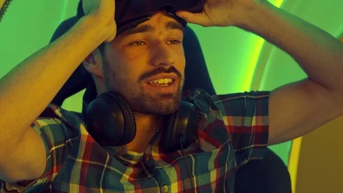 Young man sharing his emotions after virtual reality experience Stockbeeldmateriaal 74388599