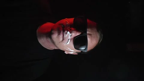 Young man shaving his face with white foam Stock Footage 308538176