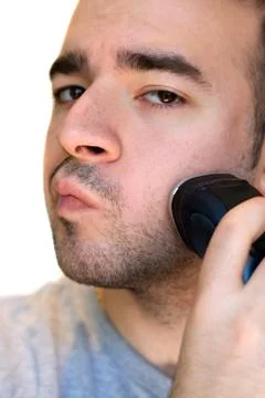 Young Man Shaving Stock Photos
