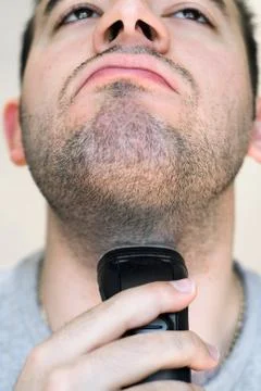 Young Man Shaving Stock Photos