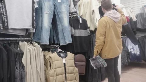 Young man shopping 2 Stock Footage 254574809