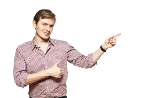 Young man is showing something Photos