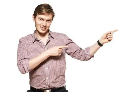Young man is showing something Stock Photos