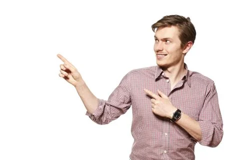 Young man is showing something Stock Photos