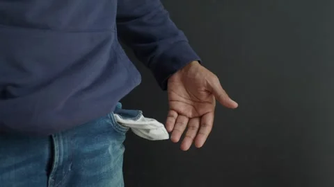 Young man shows empty pant pocket with copy space Stock Footage 284687654