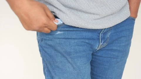 Young man shows empty pant pocket with copy space Stock Footage 285922718