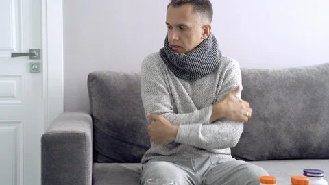 Young man sick and freezing at home. Stock Footage 112645552