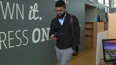 Young man signing a document for a young woman 動画素材 77080223