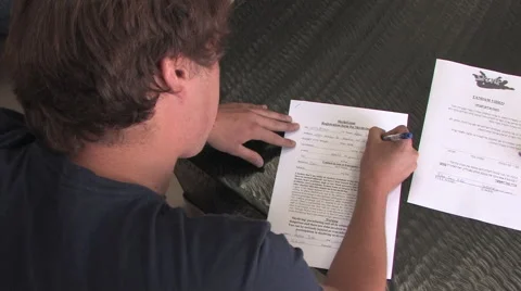 Young Man Signs Release to Parachute out of airplane Vídeos de archivo 52467754