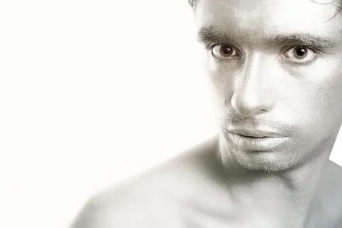 Young man with silver makeup Stock Photos