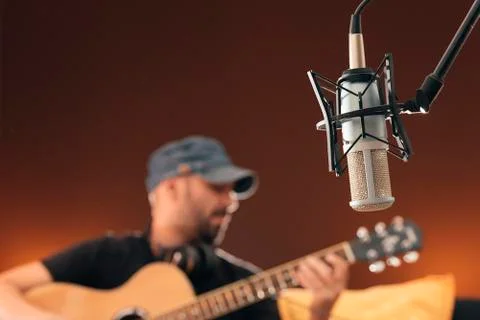 Young man singing in direct. Stock Photos