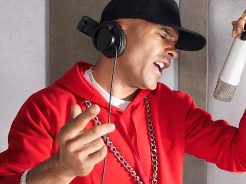 Young Man Singing In Studio Stock Photos