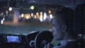 The young man sits in the car and puts on a protective face mask 4k or 4k+ Resolution