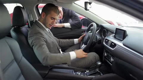 Young man sitting in car Stock Footage 252681222