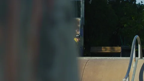 Young man in a skatepark Stock Footage 100054530