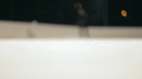 Young man skating on the ice Stock Footage 10736799