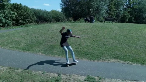 Young man skating at the park Stock Footage 151657121