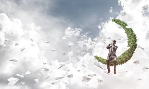 Young man in sky on moon do not want to see anything Stock Photos