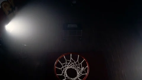 Young man slam dunks from trampoline in slow motion Video stock 123520242