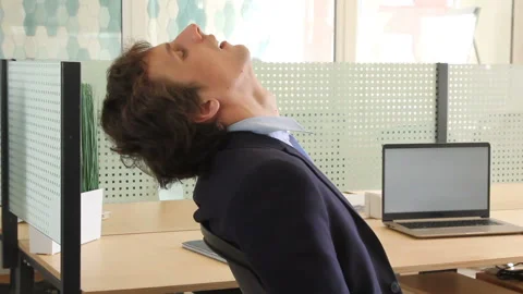 Young man sleeping in workplace Stock Footage 90431012