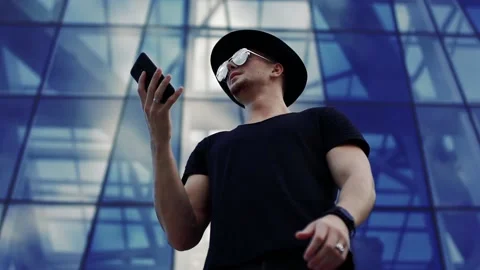 Young man with a smartphone Stock Footage 95017542