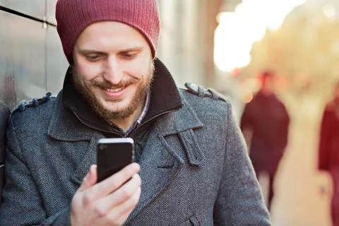Young man with smartphone Stock Photos