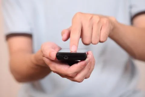 Young man with smartphone Stock Photos
