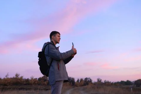 Young man with smartphone Stock Photos