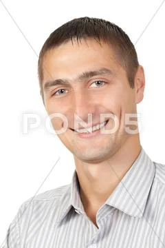 Young man smiles in the striped shirt Stock Photos