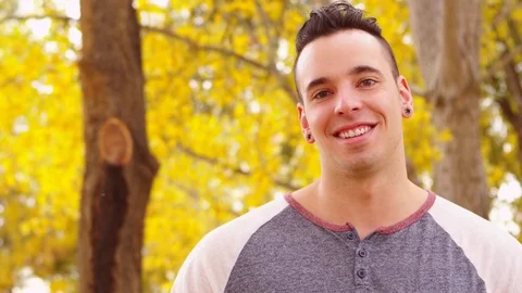 Young man smiling in autumn Stock Footage 80184509