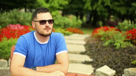 Young man is smiling to the camera Stock Footage 65818197