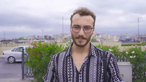 Young man smiling at camera. Video stock 212666842