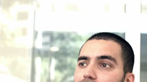 Young man is smiling doing funny faces Stock Footage 42460605