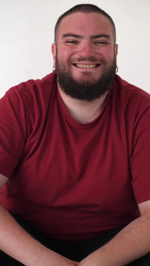 Young Man Smiling to Ease Tension Stock Footage 295143252