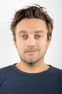 Young man smiling Stock Photos