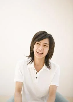 Young man smiling Stock Photos